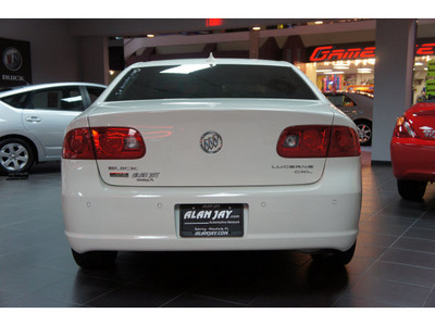 buick lucerne 2009 off white sedan cxl flex fuel 6 cylinders front wheel drive automatic 33870