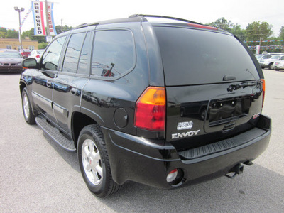gmc envoy 2004 black suv slt 4x4 gasoline 6 cylinders 4 wheel drive automatic 62863