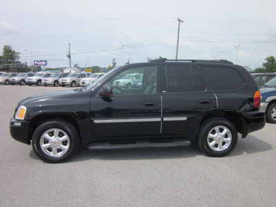 gmc envoy 2004 black suv slt 4x4 gasoline 6 cylinders 4 wheel drive automatic 62863