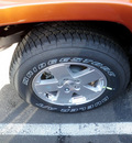 jeep wrangler unlimited 2011 orange suv sahara gasoline 6 cylinders 4 wheel drive 6 speed manual 08844