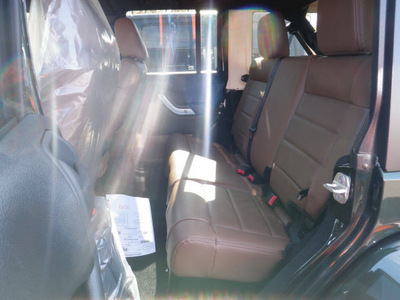 jeep wrangler unlimited 2011 green suv sahara gasoline 6 cylinders 4 wheel drive 6 speed manual 08844