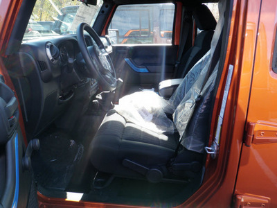 jeep wrangler unlimited 2011 orange suv sport gasoline 6 cylinders 4 wheel drive 6 speed manual 08844
