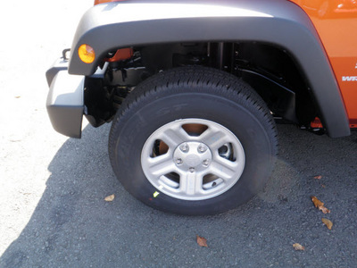 jeep wrangler 2011 orange suv sport gasoline 6 cylinders 4 wheel drive automatic with overdrive 08844