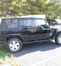 jeep wrangler unlimited 2011 black suv sahara gasoline 6 cylinders 4 wheel drive automatic with overdrive 08844