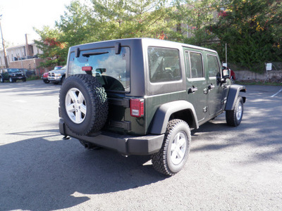 jeep wrangler unlimited 2011 green suv sport gasoline 6 cylinders 4 wheel drive automatic with overdrive 08844