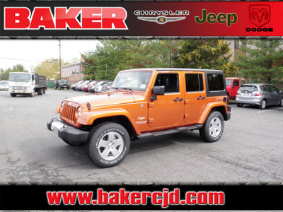 jeep wrangler unlimited 2011 orange suv sahara gasoline 6 cylinders 4 wheel drive automatic with overdrive 08844