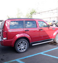 dodge nitro 2010 dk  red suv gasoline 6 cylinders 4 wheel drive automatic with overdrive 08844