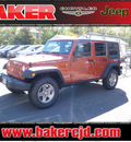jeep wrangler 2010 orange suv unlmted rubicon gasoline 6 cylinders 4 wheel drive 6 speed manual 08844