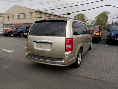 chrysler town country 2010 gold van gasoline 6 cylinders front wheel drive automatic with overdrive 08844