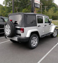 jeep wrangler unlimited 2011 silver suv sahara gasoline 6 cylinders 4 wheel drive automatic with overdrive 08844