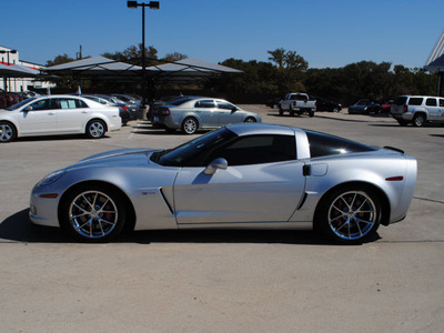 chevrolet corvette 2009 silver coupe z06 gasoline 8 cylinders rear wheel drive 6 speed manual 76087