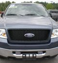 ford f 150 2006 blue gasoline 8 cylinders 4 wheel drive automatic with overdrive 13502