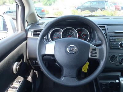 nissan versa 2010 silver sedan 1 8 s gasoline 4 cylinders front wheel drive automatic 28557