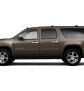 chevrolet suburban 2011 brown suv ltz 1500 flex fuel 8 cylinders 4 wheel drive automatic with overdrive 55391