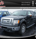 ford f 150 2011 black lariat gasoline 6 cylinders 4 wheel drive automatic with overdrive 07735