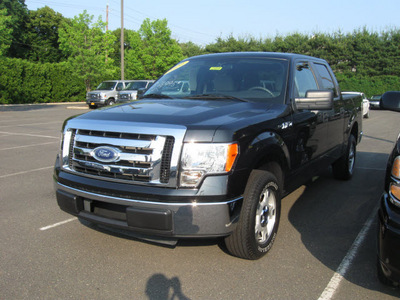 ford f 150 2010 black xlt gasoline 8 cylinders 2 wheel drive automatic with overdrive 08902