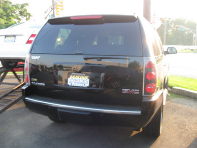 gmc yukon 2009 black suv denali gasoline 8 cylinders all whee drive automatic with overdrive 08902