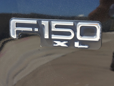 ford f 150 2002 black pickup truck xl sport gasoline 6 cylinders rear wheel drive 5 speed manual 76108