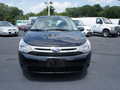 ford focus 2010 black sedan se gasoline 4 cylinders front wheel drive 5 speed manual 08753