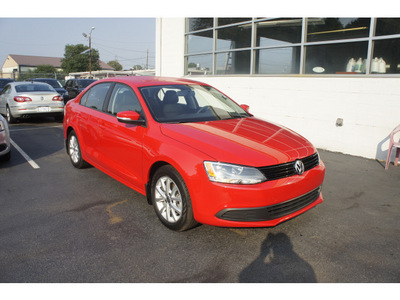 volkswagen jetta 2011 red sedan se gasoline 5 cylinders 5 speed manual 08016