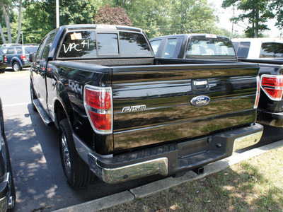 ford f 150 2011 black xlt gasoline 6 cylinders 4 wheel drive automatic with overdrive 08753