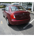 hyundai accent 2009 dk  red sedan gls gasoline 4 cylinders front wheel drive 5 speed manual 07724