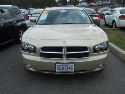 dodge charger 2010 white gold sedan sxt gasoline 6 cylinders rear wheel drive 4 speed automatic 99212