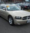 dodge charger 2010 white gold sedan sxt gasoline 6 cylinders rear wheel drive 4 speed automatic 99212