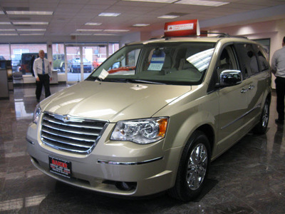 chrysler town and country 2010 gold van limited gasoline 6 cylinders front wheel drive automatic with overdrive 08844