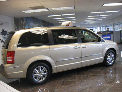 chrysler town and country 2010 gold van limited gasoline 6 cylinders front wheel drive automatic with overdrive 08844