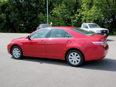 toyota camry 2007 red sedan xle gasoline 4 cylinders front wheel drive automatic 56001