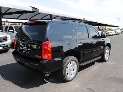 gmc yukon 2011 black suv slt flex fuel 8 cylinders 2 wheel drive automatic 76087