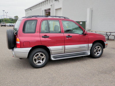 chevrolet tracker 2001 red suv lt 4wd gasoline 6 cylinders 4 wheel drive automatic with overdrive 56001