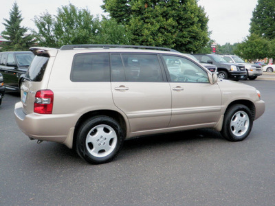 toyota highlander 2005 gold suv ltd 4wd gasoline 6 cylinders all whee drive automatic with overdrive 55124