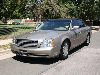 cadillac deville 2004 beige sedan gasoline 8 cylinders front wheel drive automatic 80110