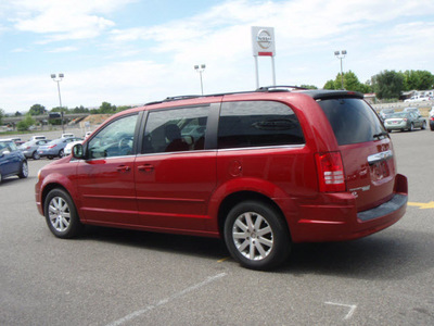 chrysler town and country 2008 red van touring gasoline 6 cylinders front wheel drive automatic 99301