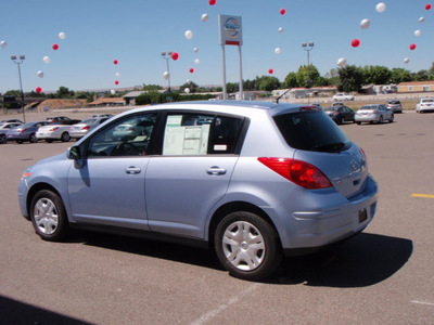 nissan versa 2011 blue hatchback 1 8 s gasoline 4 cylinders front wheel drive 4 speed automatic 99301