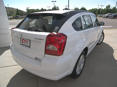 dodge caliber 2011 white hatchback uptown gasoline 4 cylinders front wheel drive automatic 81212