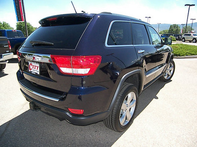 jeep grand cherokee 2011 blackberry pearl suv overland gasoline 6 cylinders 4 wheel drive automatic 81212