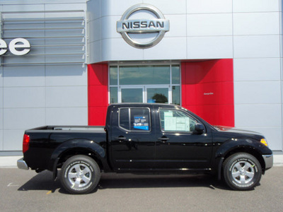 nissan frontier 2011 black sv v6 gasoline 6 cylinders 4 wheel drive 5 speed automatic 99301