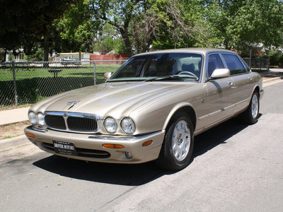 jaguar xj series 1999 beige sedan xj8l gasoline v8 rear wheel drive automatic 80110