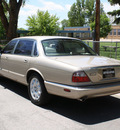 jaguar xj series 1999 beige sedan xj8l gasoline v8 rear wheel drive automatic 80110