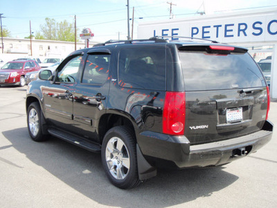 gmc yukon 2011 black suv slt flex fuel 8 cylinders 4 wheel drive 6 speed automatic 98901