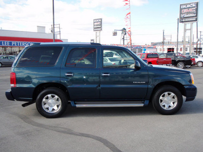 cadillac escalade 2006 teal suv gasoline 8 cylinders all whee drive 4 speed automatic 98901