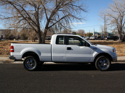 ford f 150 2006 white xlt 4x4 v 8 gasoline 8 cylinders 4 wheel drive automatic with overdrive 80012