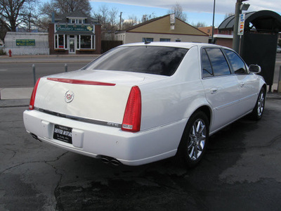 cadillac dts 2006 pearlescent white sedan luxuryiii performance pkg gasoline 8 cylinders front wheel drive automatic 80110