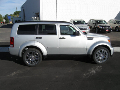 dodge nitro 2011 silver suv heat gasoline 6 cylinders 4 wheel drive automatic 80301