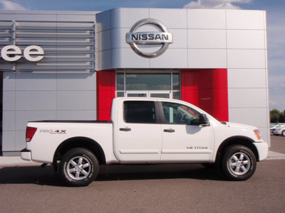nissan titan 2011 white pro 4x gasoline 8 cylinders 4 wheel drive automatic 99301