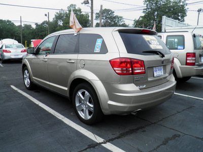 dodge journey 2009 tan suv sxt gasoline 6 cylinders all whee drive automatic 32447