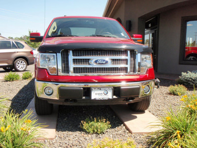 ford f 150 2009 red lariat flex fuel 8 cylinders 4 wheel drive automatic 99352